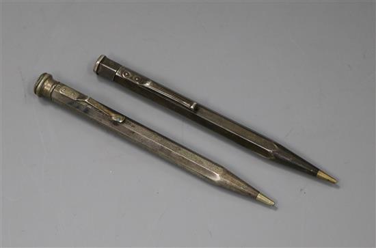 A 1930s silver cased pencil and one other white metal cased pen.